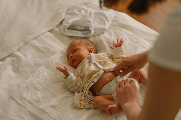 Les astuces pour emmailloter un bébé correctement à l'aide d'un lange bébé